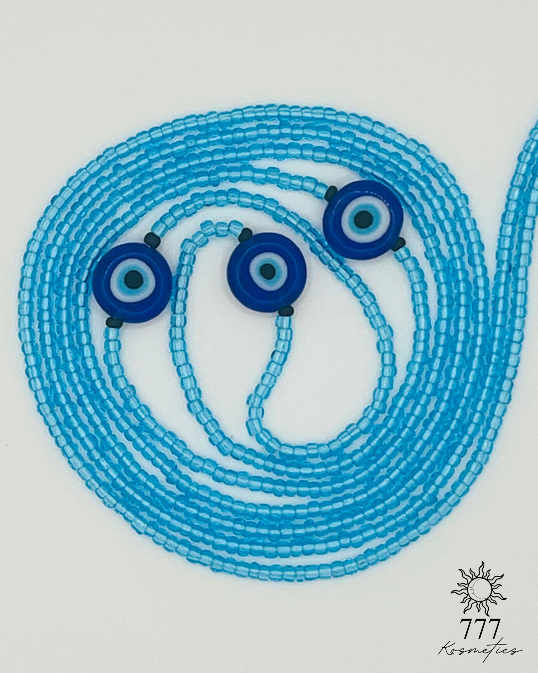 Waist Beads composed of light blue seed beads, accented with matte black beads and three blue Nazar (Evil eye)