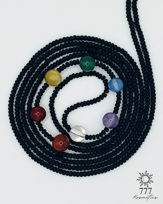 Waist beads with matte black seed beads. Includes genuine red jasper, carnelian, honey tiger eye, green aventurine, blue agate, banded amethyst, and clear quartz gemstones. 