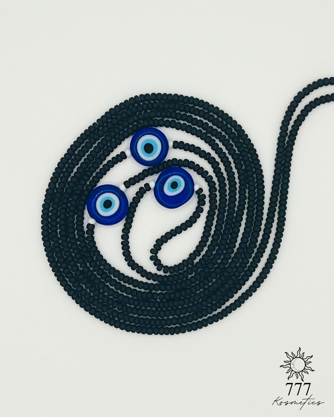 Waist Beads composed of matte black seed beads, accented white beads and three blue Nazar (Evil eye)